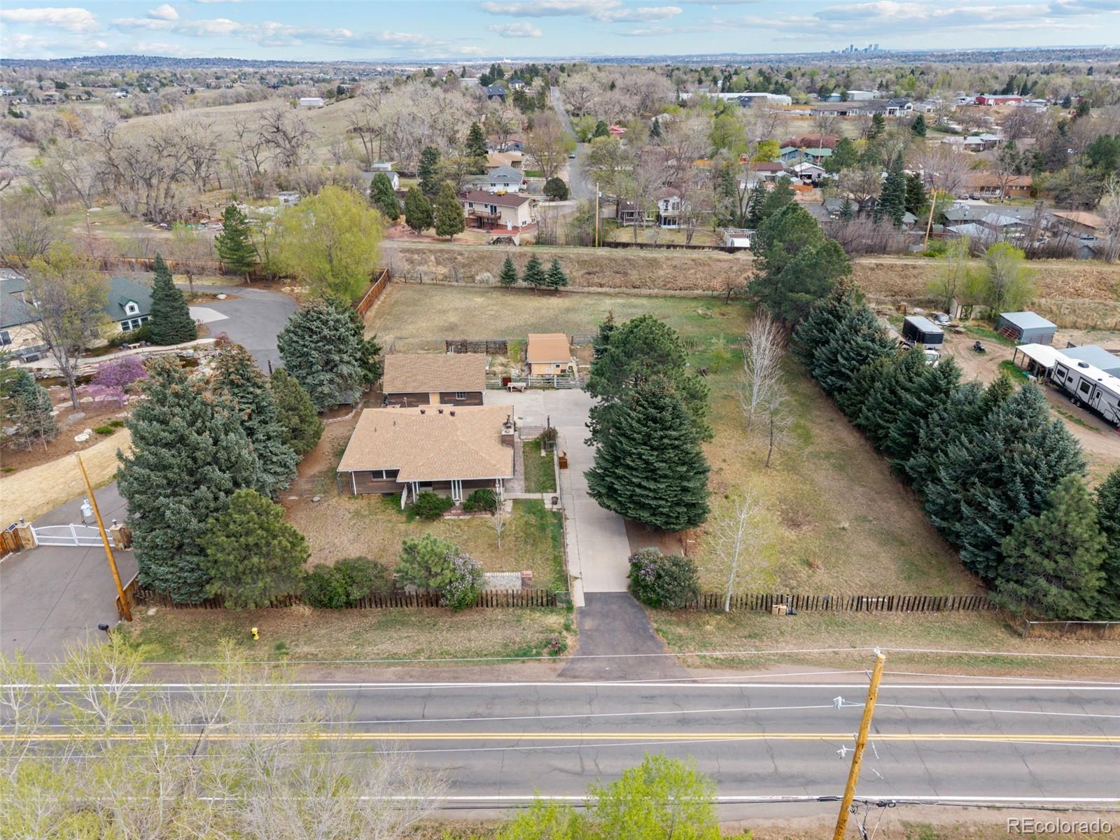 5410 Indiana Street Golden, CO 80403 - Photo 47 of 50 an aerial view of residential houses with outdoor space and parking