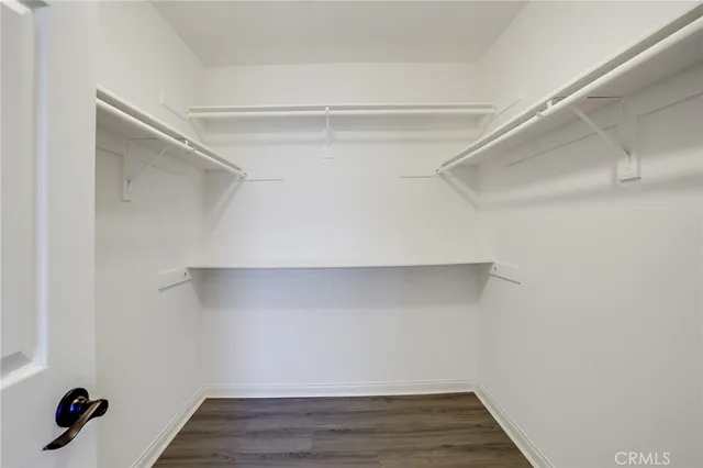 a view of an empty walk in closet