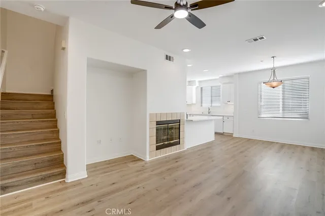 a view of a kitchen cabinets and a ceiling fan