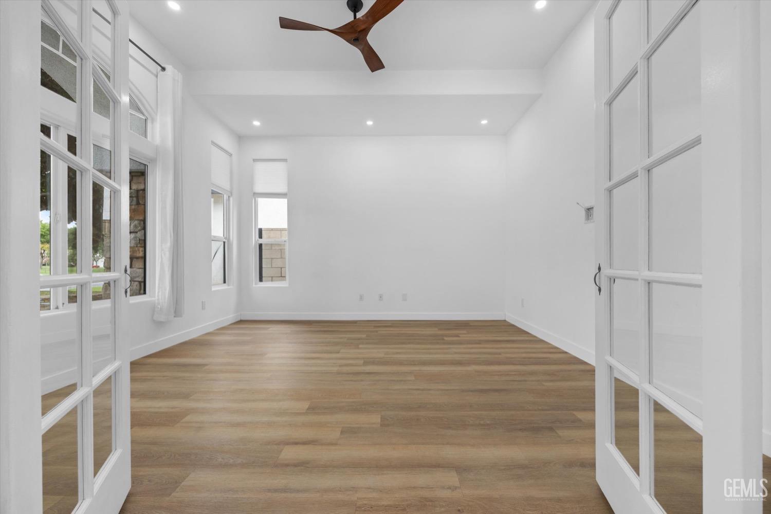 Undisclosed Address Bakersfield, CA 93311 - Photo 18 of 67 a view of an empty room with glass door