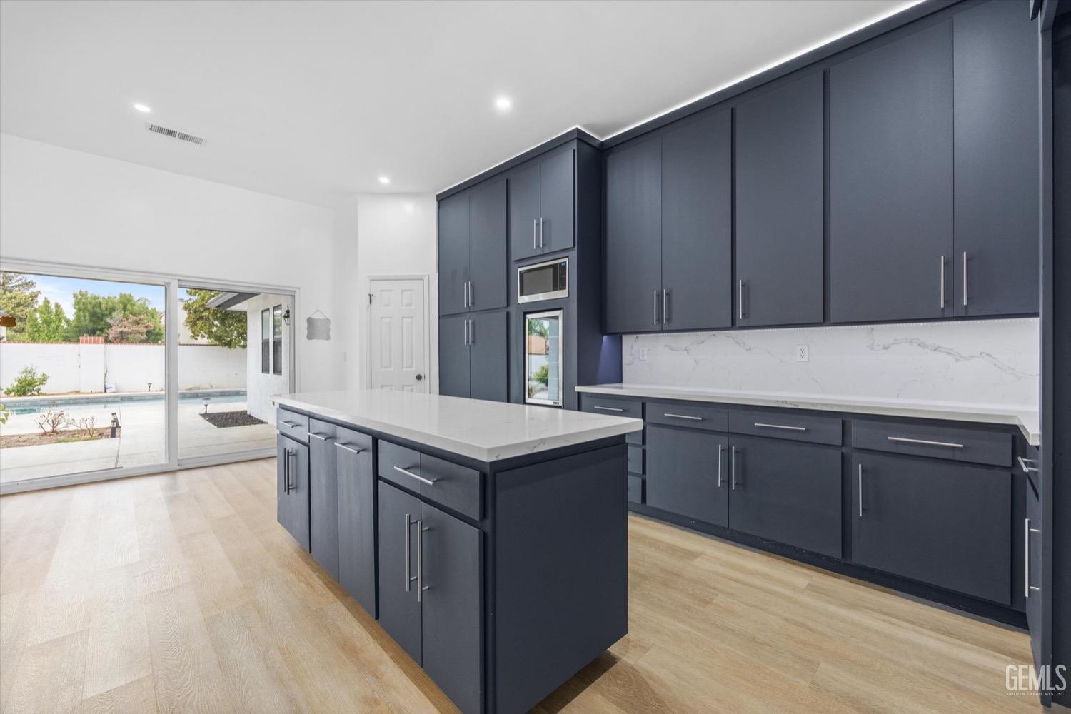 Undisclosed Address Bakersfield, CA 93311 - Photo 30 of 67 a kitchen with stainless steel appliances granite countertop wooden cabinets a sink and dishwasher