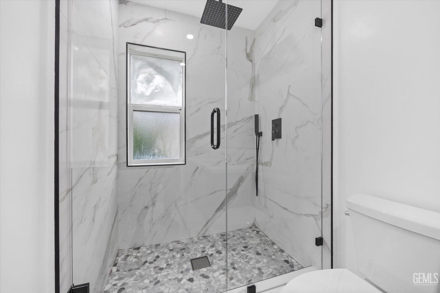 Undisclosed Address Bakersfield, CA 93311 - Photo 47 of 67 a bathroom with a sink toilet and shower