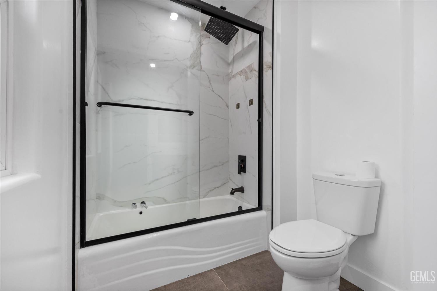 Undisclosed Address Bakersfield, CA 93311 - Photo 52 of 67 a bathroom with a shower and a toilet