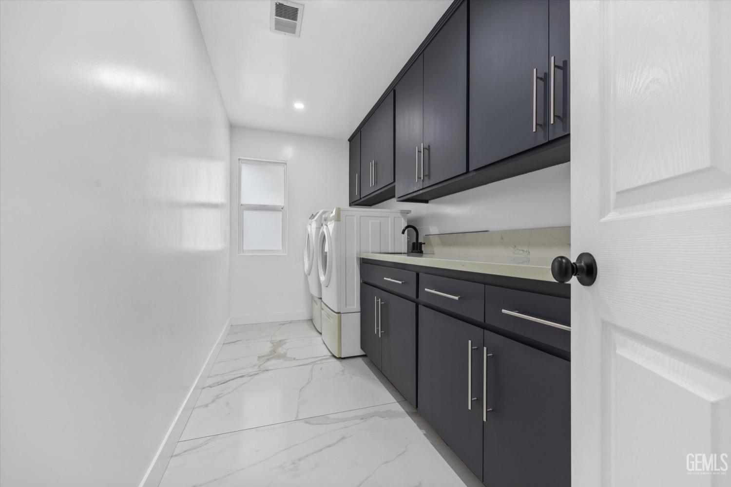 Undisclosed Address Bakersfield, CA 93311 - Photo 55 of 67 a kitchen with stainless steel appliances granite countertop a sink stove and cabinets