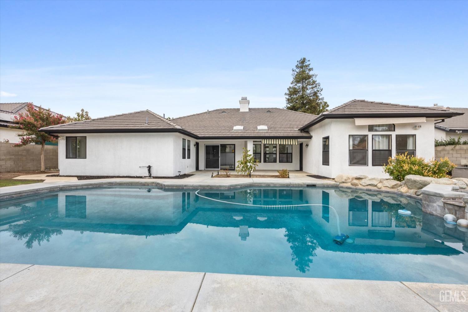 Undisclosed Address Bakersfield, CA 93311 - Photo 59 of 67 a front view of a house with swimming pool