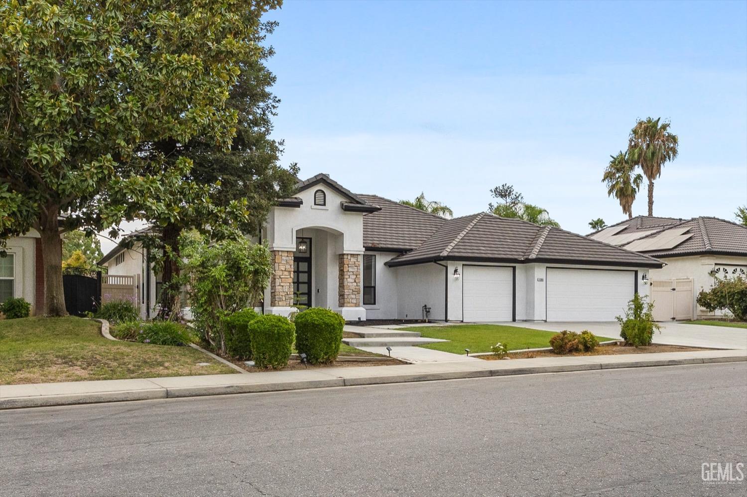Undisclosed Address Bakersfield, CA 93311 - Photo 10 of 67 a view of a house with a garden