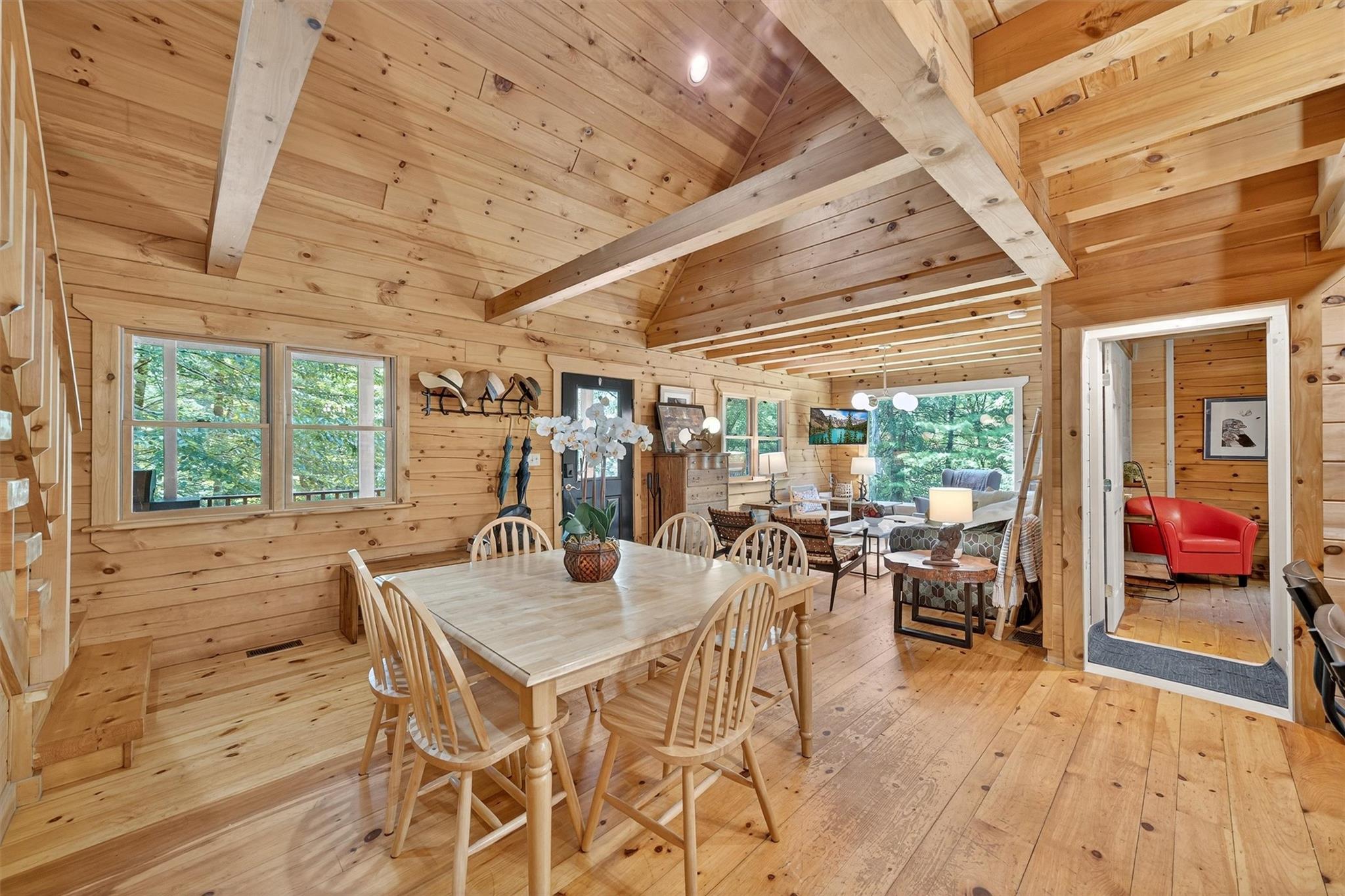 353 John Davis Road Beach Lake, PA 18405 - Photo 11 of 50 a view of a dining room with furniture wooden floor and a chandelier