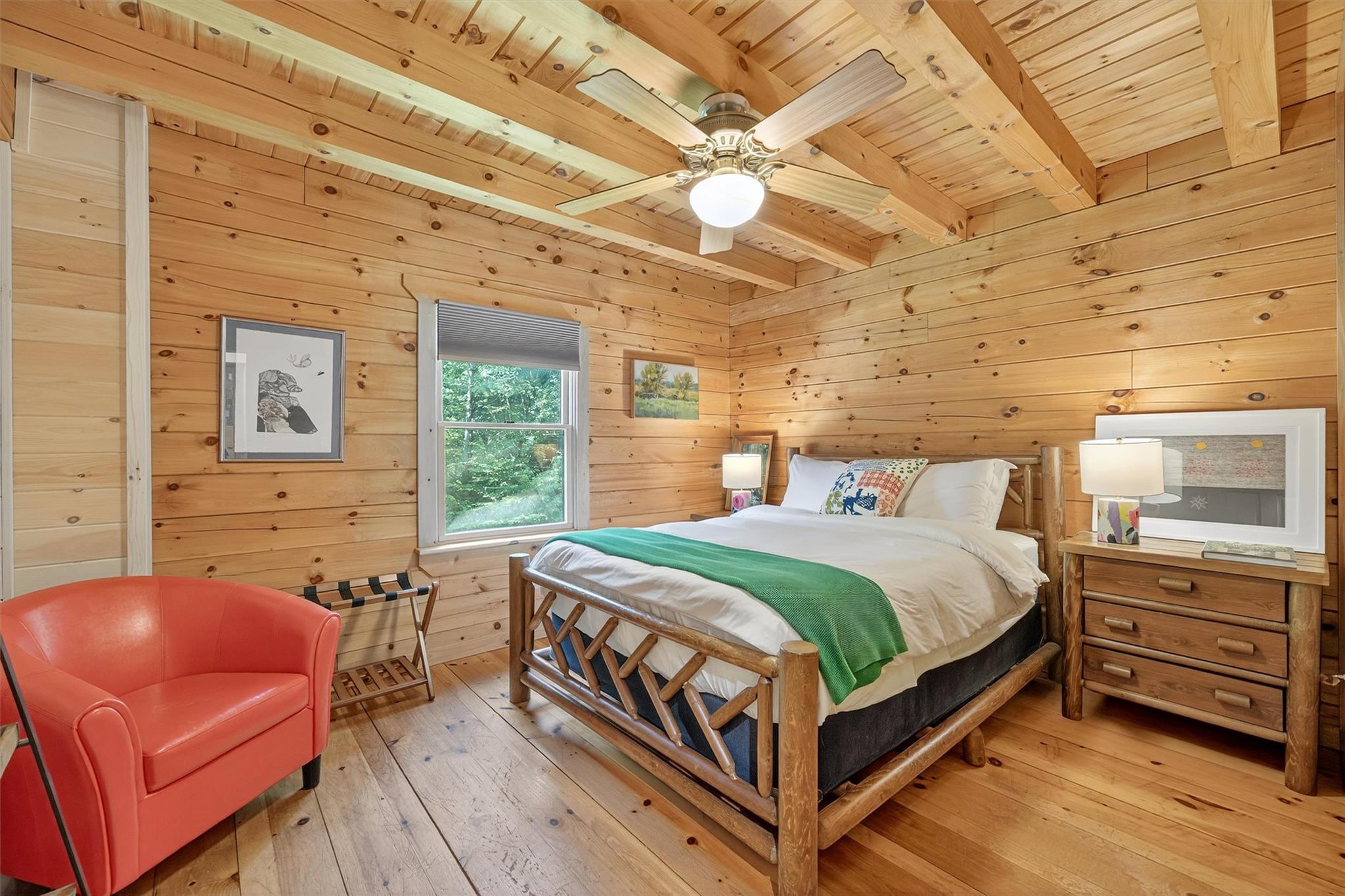 353 John Davis Road Beach Lake, PA 18405 - Photo 24 of 50 a bedroom with a bed and wooden floor