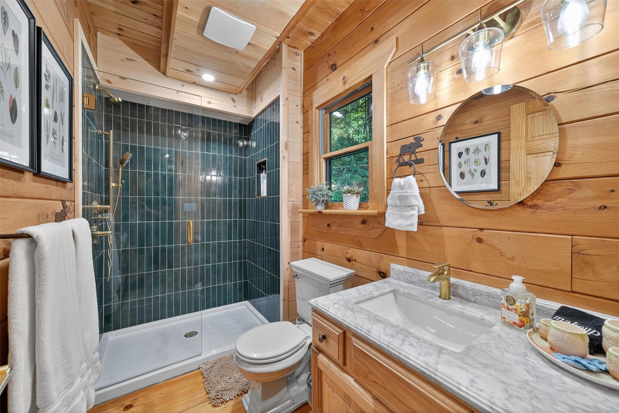 353 John Davis Road Beach Lake, PA 18405 - Photo 25 of 50 a bathroom with a sink toilet and shower