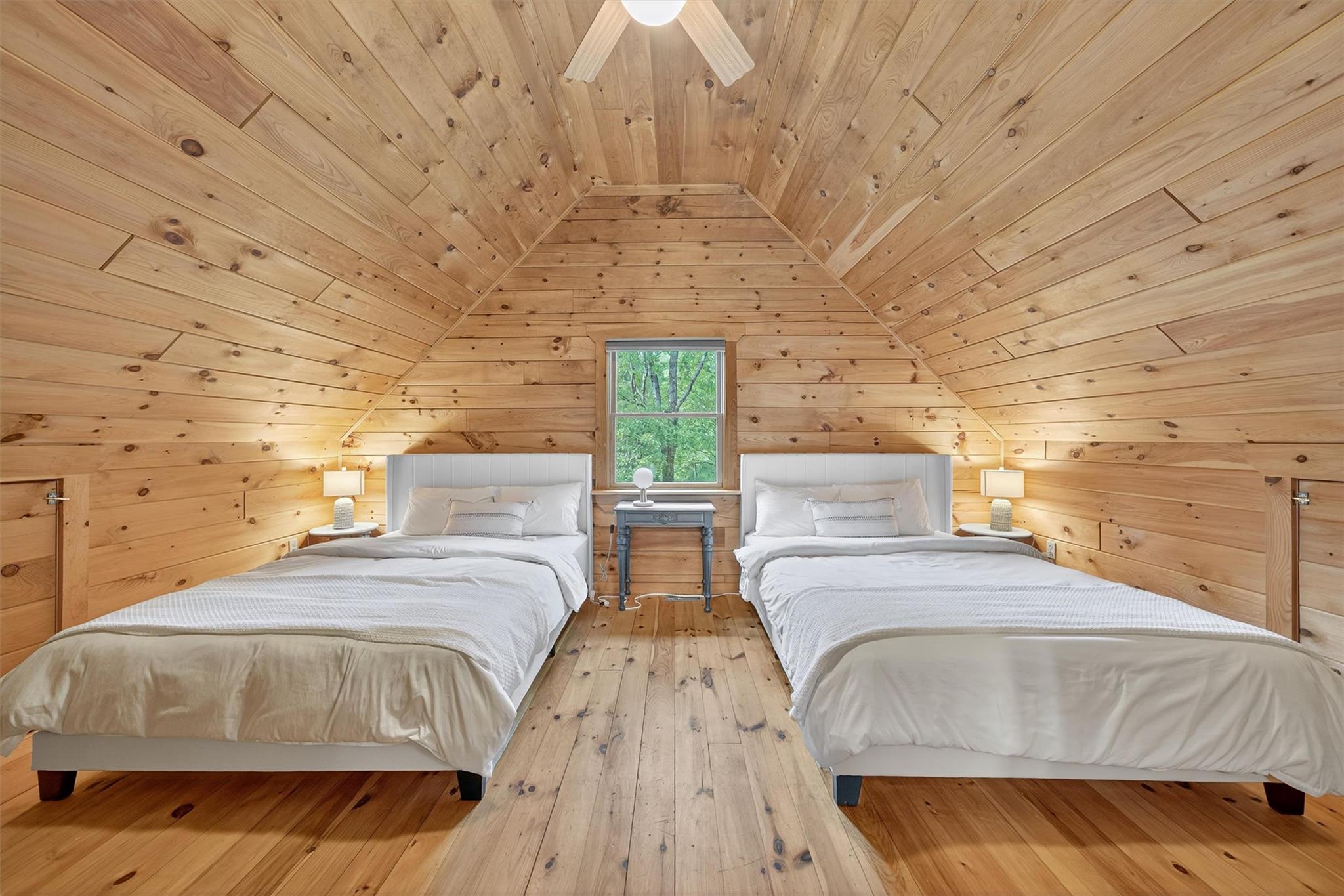 353 John Davis Road Beach Lake, PA 18405 - Photo 30 of 50 a spacious bedroom with two beds and a desk