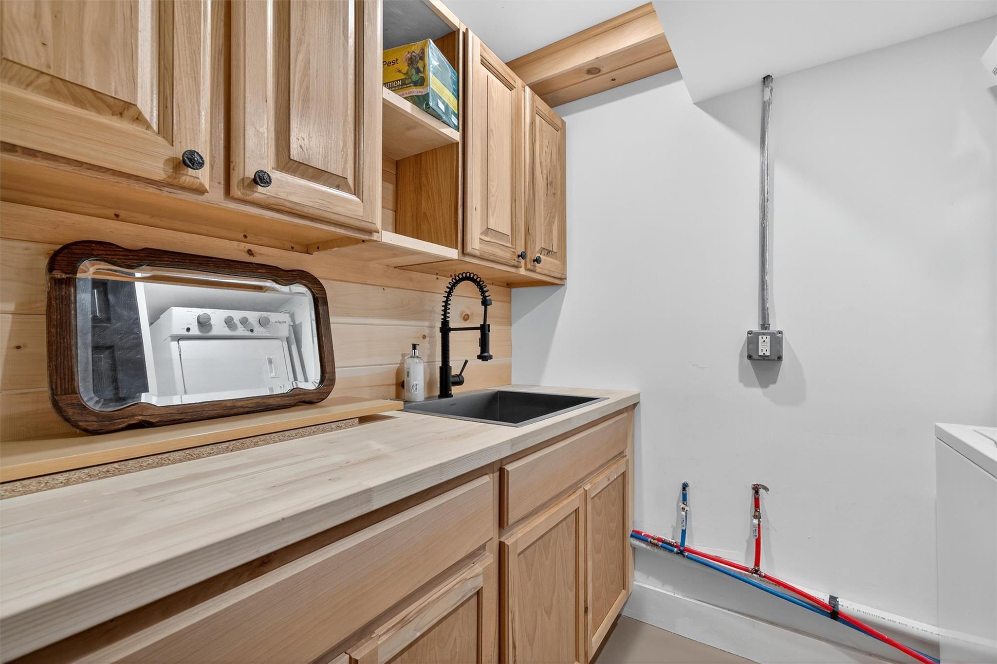 353 John Davis Road Beach Lake, PA 18405 - Photo 37 of 50 a kitchen with a sink cabinets and a wooden floor