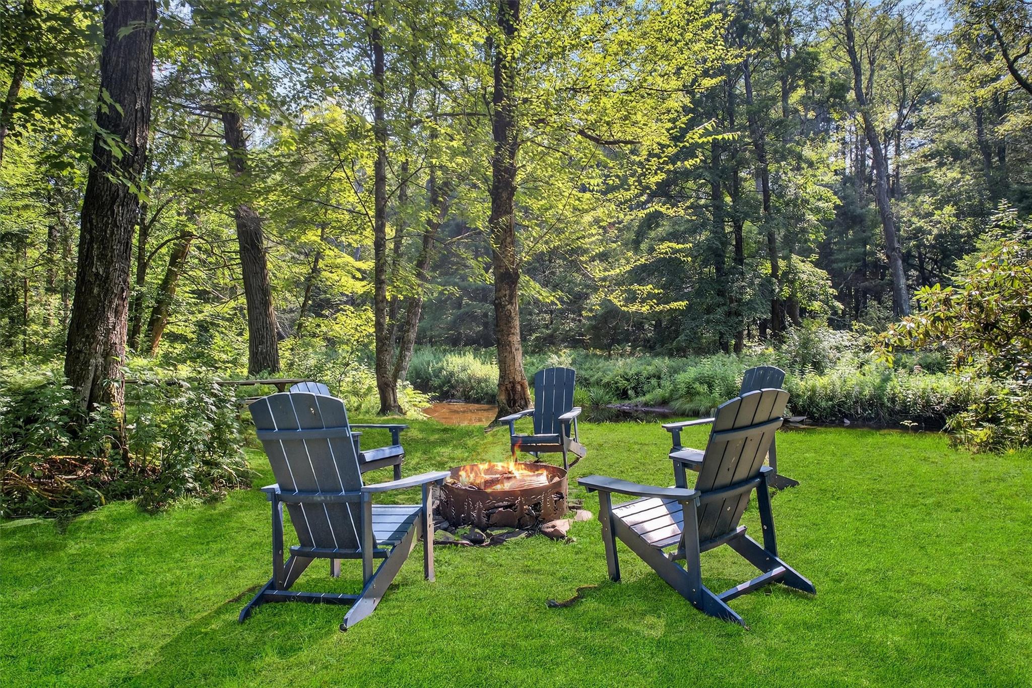 353 John Davis Road Beach Lake, PA 18405 - Photo 44 of 50 a view of a table and chairs in the garden