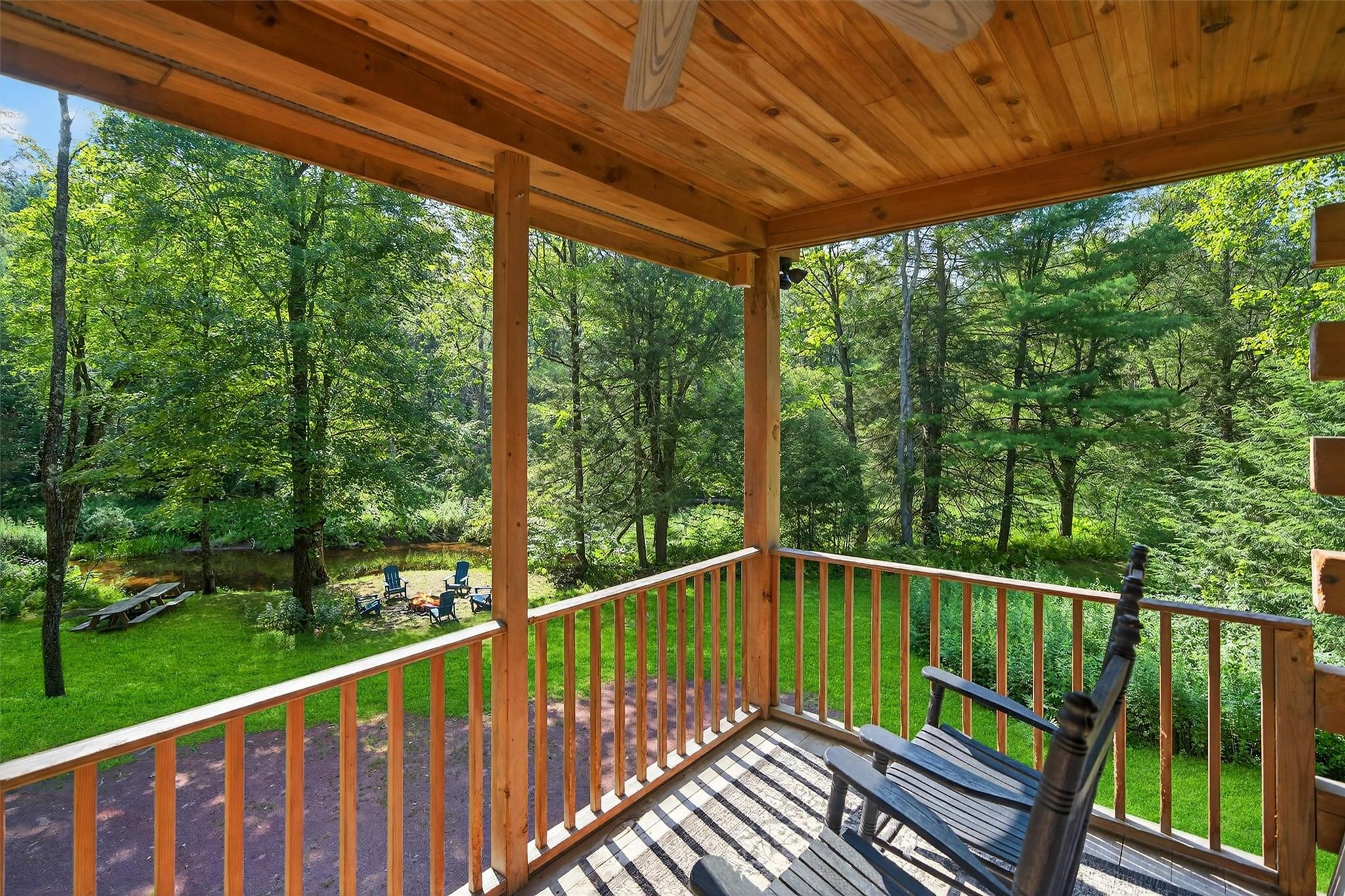 353 John Davis Road Beach Lake, PA 18405 - Photo 9 of 50 a view of balcony with deck and trees