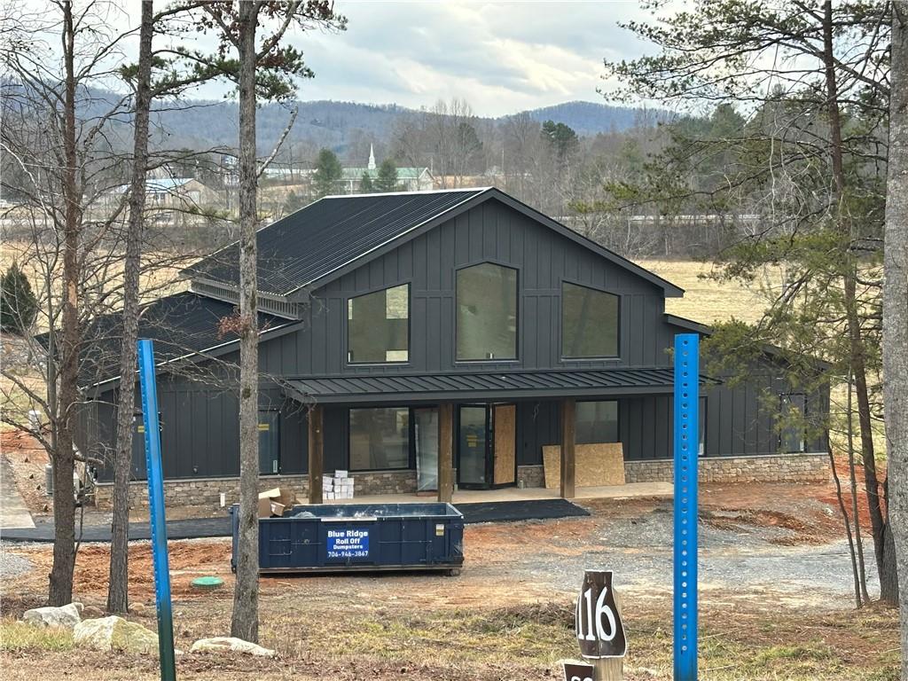 0 Ridge Drive Morganton, GA 30560 - Photo 15 of 15 a front view of a house with garden