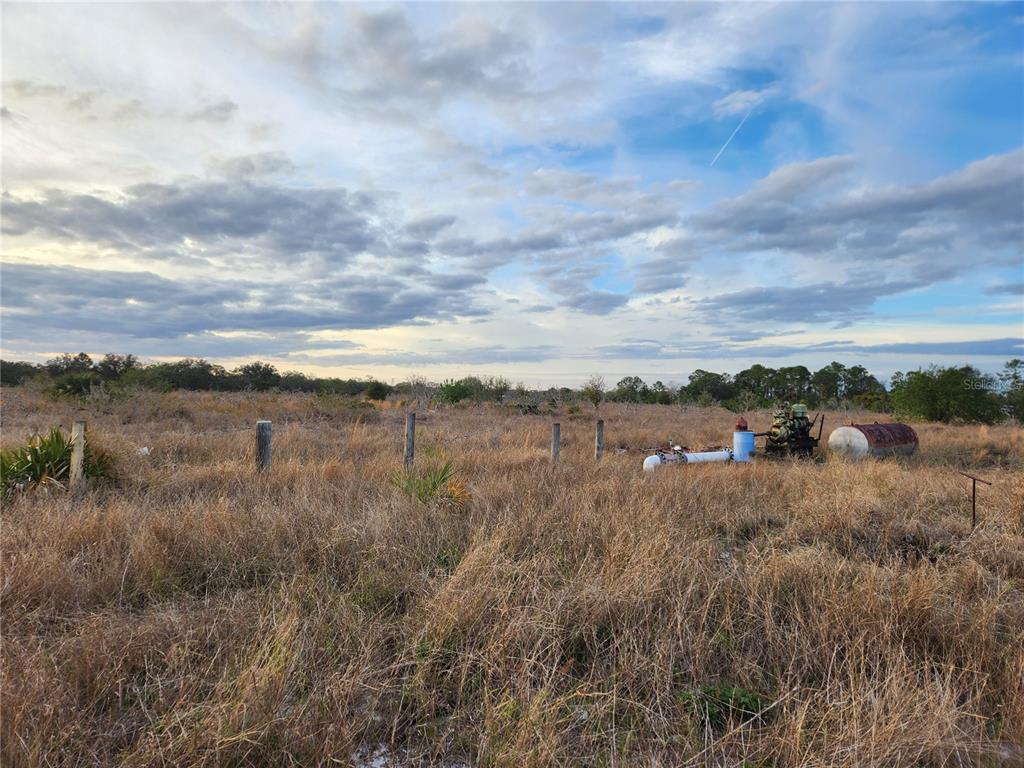 West Frostproof Road Frostproof, FL 33843 - Photo 2 of 29 a view of a lake from a yard