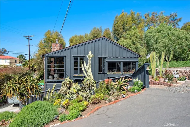 a house view with a garden space