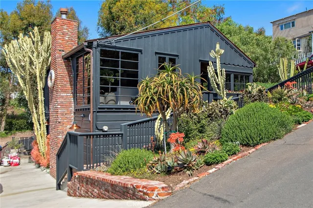 a house view with a garden space
