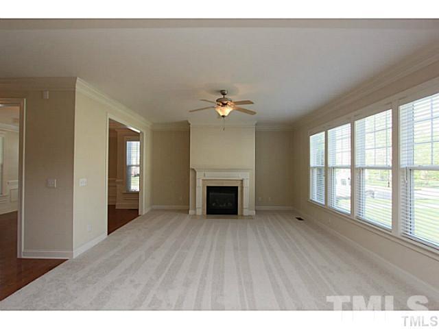 4701 All Points View Way Raleigh, NC 27614 - Photo 6 of 20 Spacious family room with neutral decor, gas fireplace, lots of windows, opens to kitchen and dining room. Brand new carpeting!