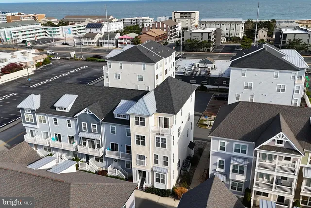 a view of multiple houses with a city street