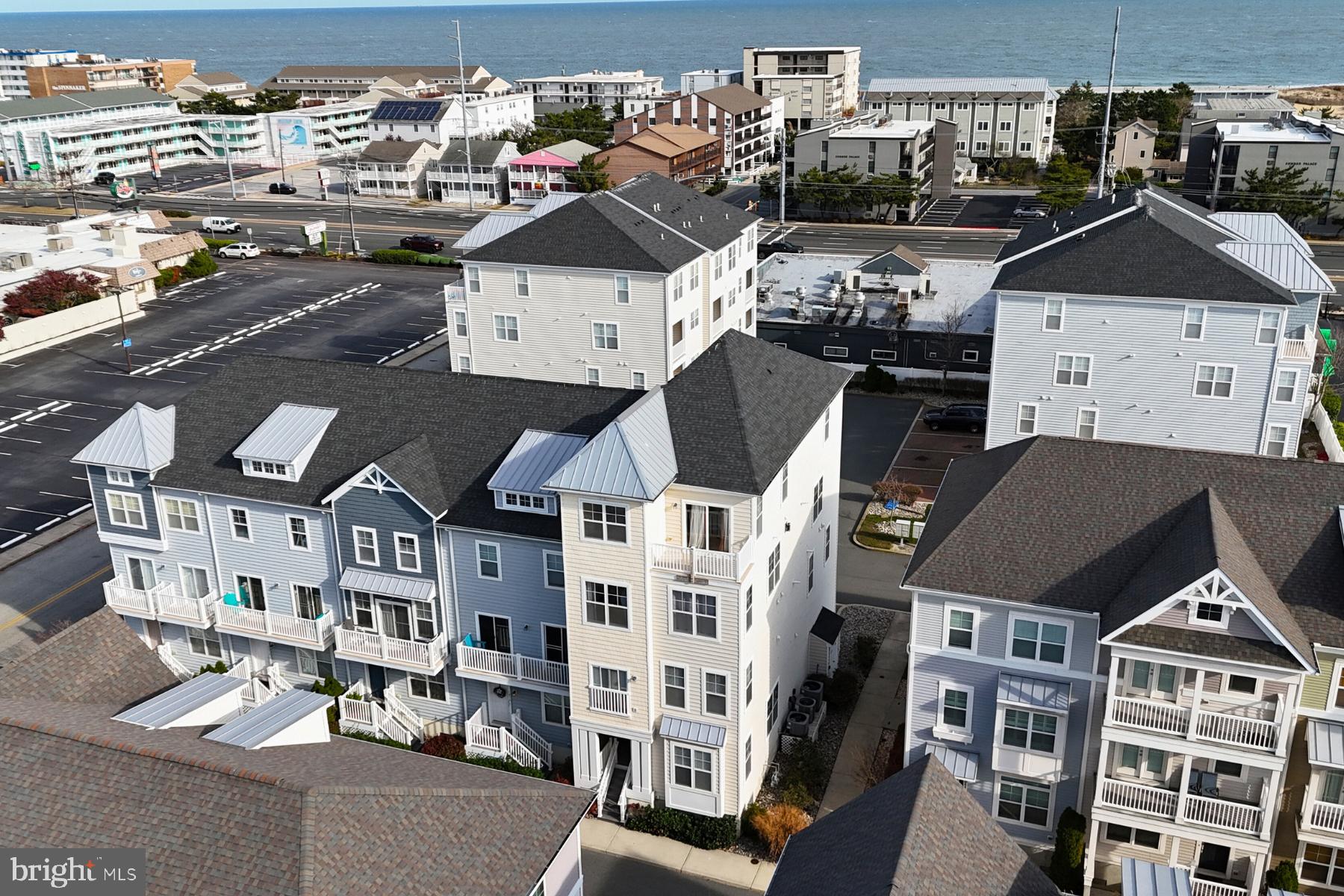 a view of multiple houses with a city street