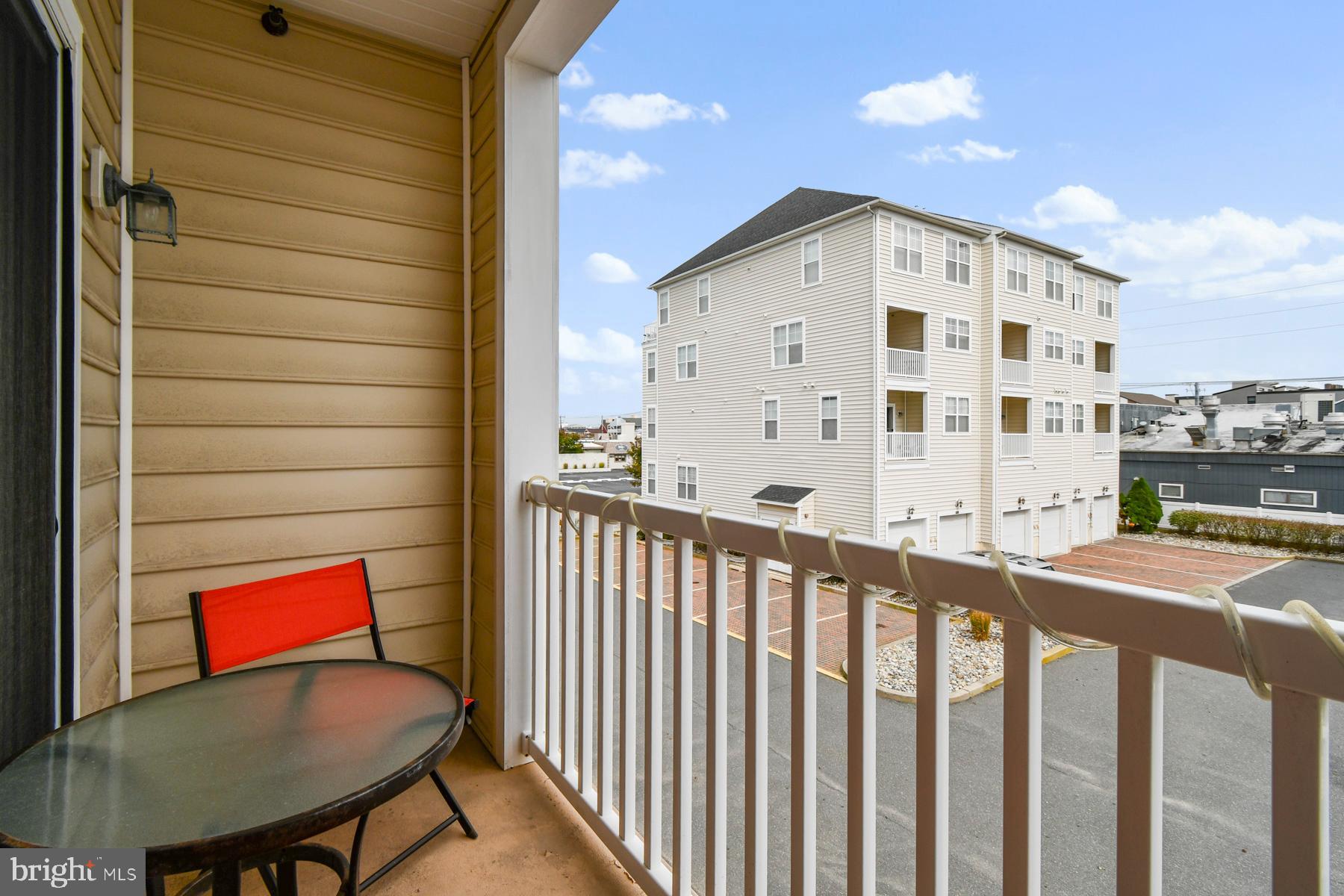 107 70th Street, Unit 10F Ocean City, MD 21842 - Photo 12 of 33 a view of building from the balcony