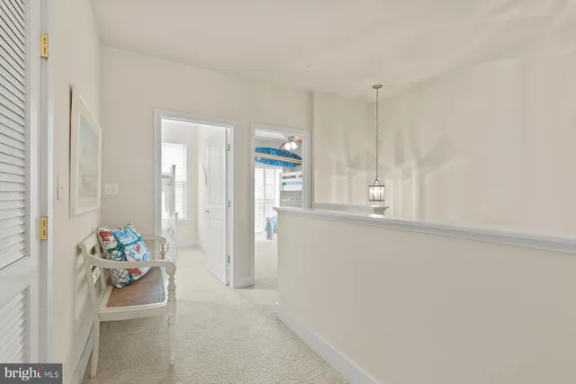 a view of a livingroom with an empty space and a window