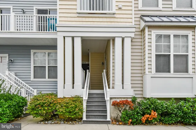 a view of an buildings from the balcony