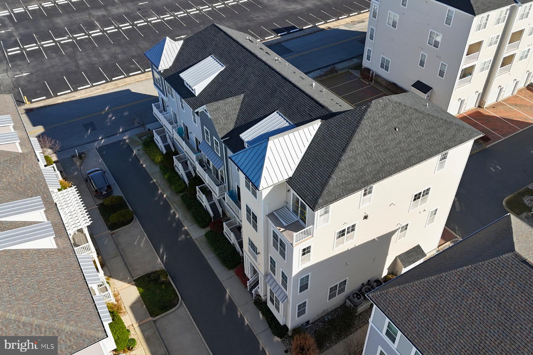 107 70th Street, Unit 10F Ocean City, MD 21842 - Photo 26 of 33 a view of an buildings from the balcony