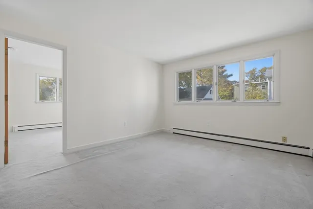 an empty room with windows