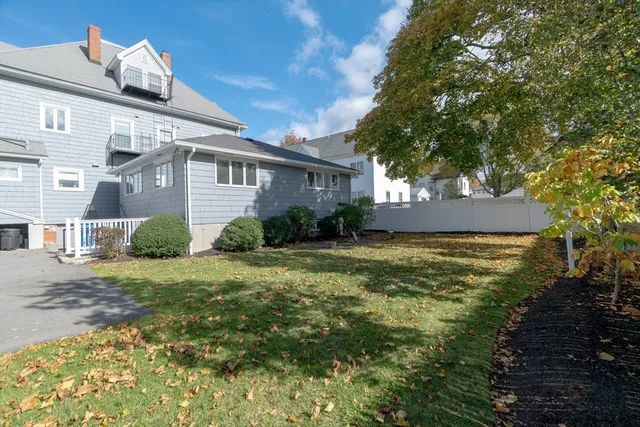 a front view of house with garden
