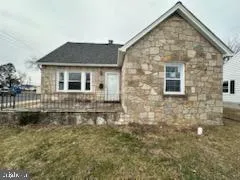 a front view of a house with lake view