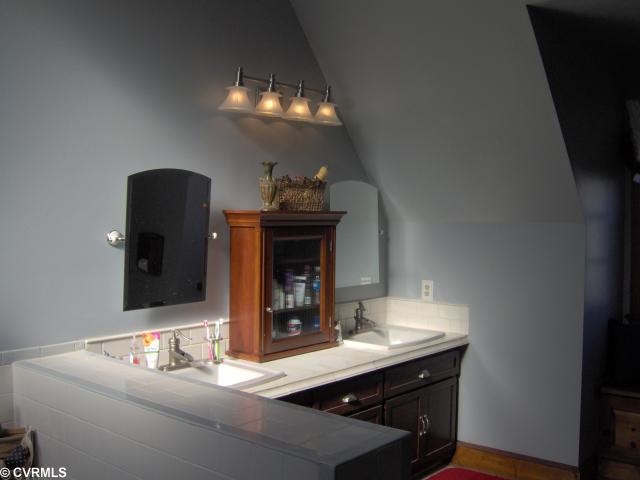 507 Rothschild Drive Chester, VA 23836 - Photo 11 of 11 Master Bath/Spa - This is a very spacious master bathroom with sunken tub, custom double vanity, seperate shower, and cathedral ceilings.