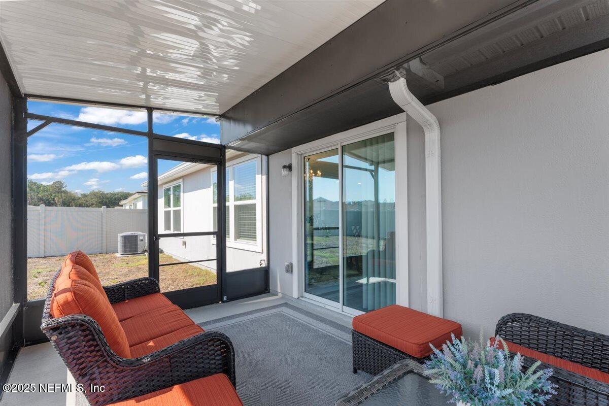 137 Tordera Ln Street St. Augustine, FL 32084 - Photo 19 of 43 a outdoor living space with furniture and a garden