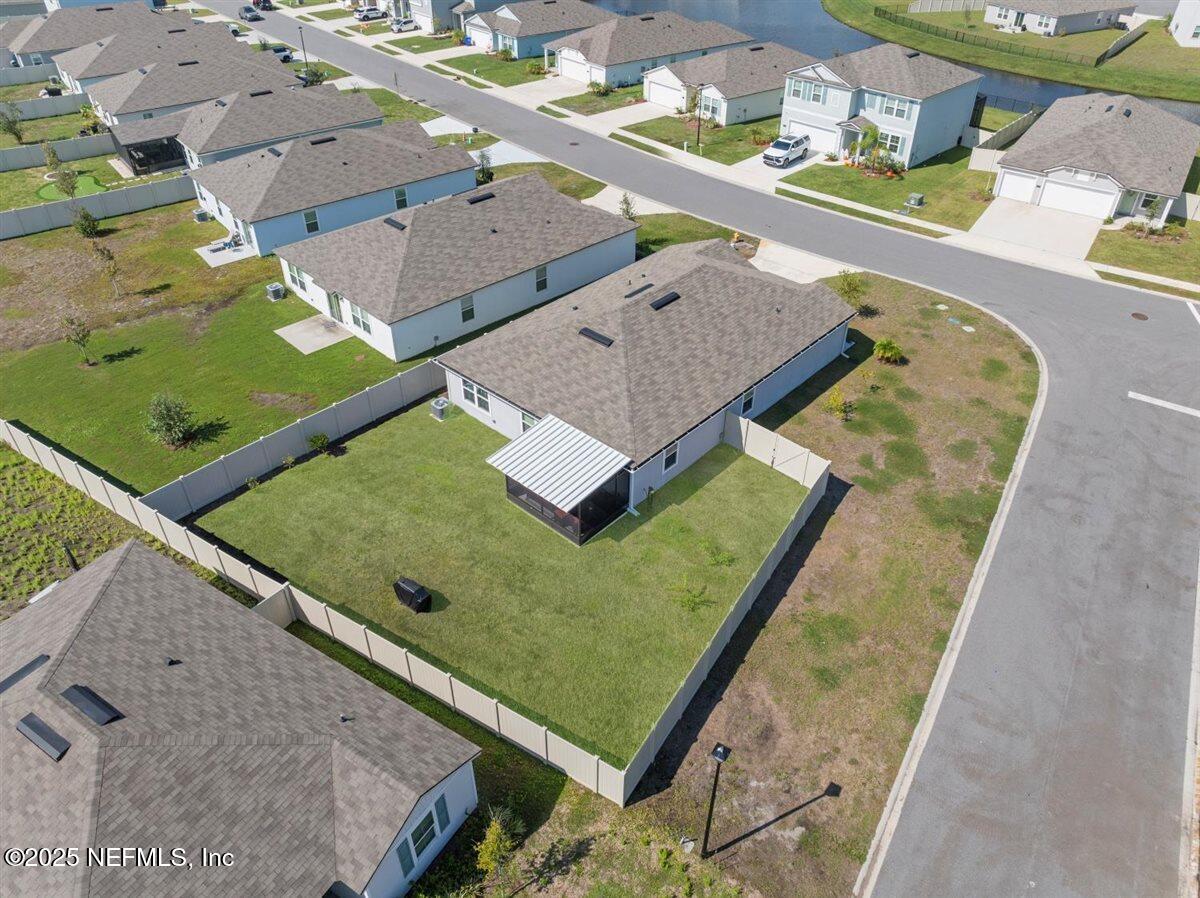 137 Tordera Ln Street St. Augustine, FL 32084 - Photo 31 of 43 an aerial view of a pool patio water fountain and an outdoor seating