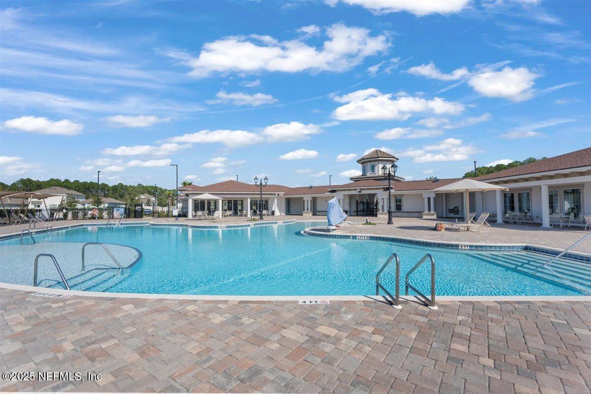 137 Tordera Ln Street St. Augustine, FL 32084 - Photo 39 of 43 a balcony with table and chairs