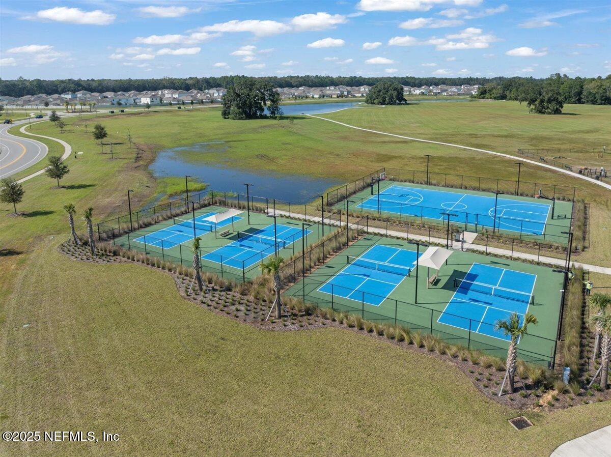 137 Tordera Ln Street St. Augustine, FL 32084 - Photo 40 of 43 an aerial view of a houses with outdoor space swimming pool and lake view