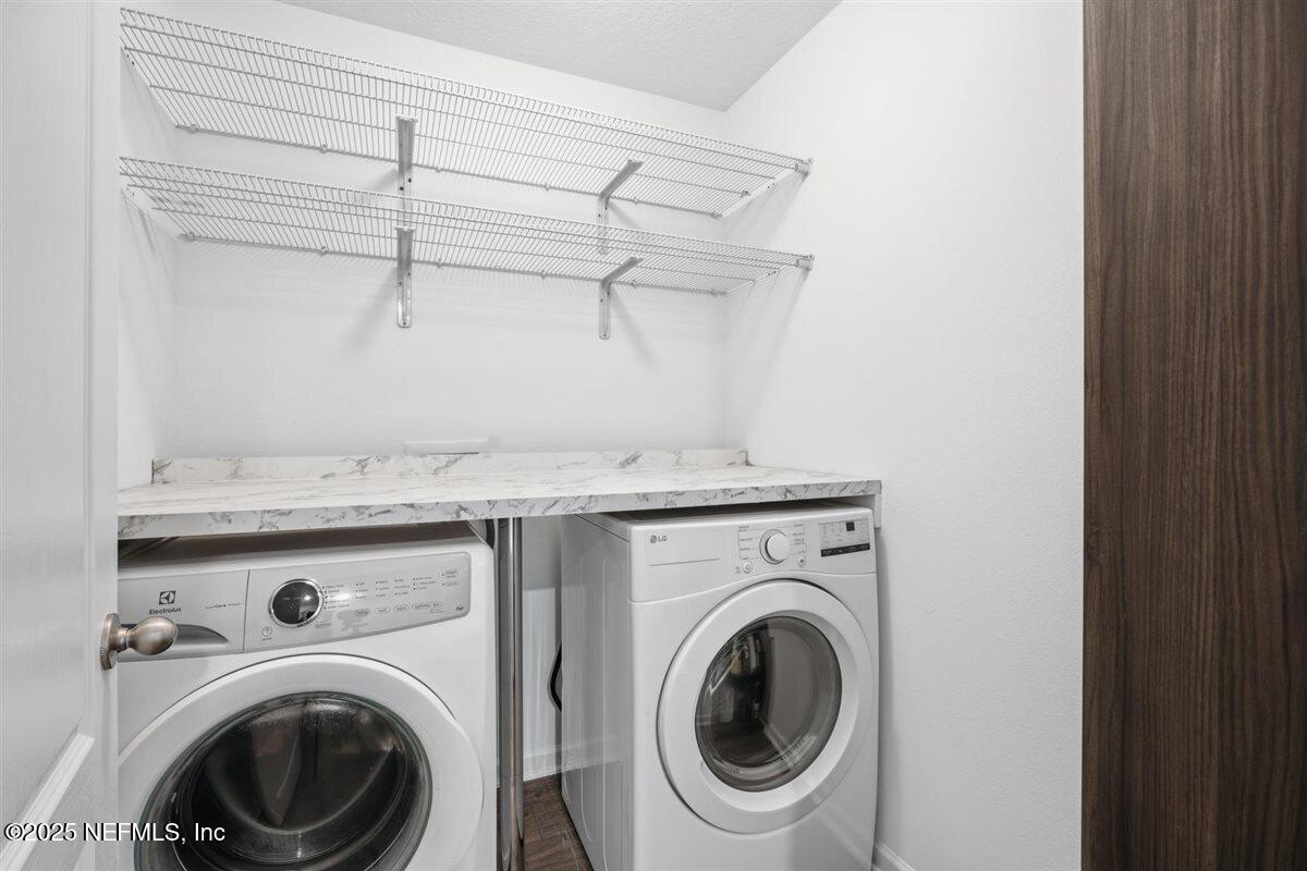 137 Tordera Ln Street St. Augustine, FL 32084 - Photo 10 of 43 a utility room with dryer and washer