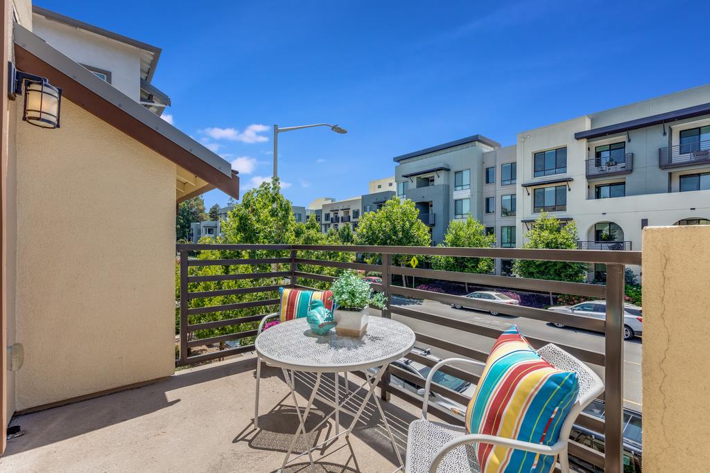 2909 Kaiser Drive Santa Clara, CA 95051 - Photo 11 of 29 a view of a patio with table and chairs potted plants with wooden floor