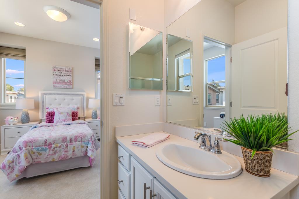2909 Kaiser Drive Santa Clara, CA 95051 - Photo 20 of 29 a bedroom with a bed and a sink