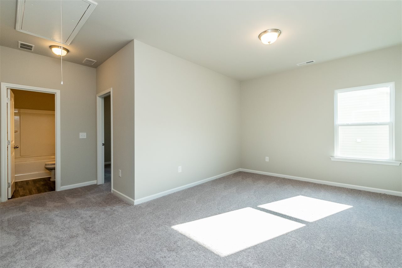 6818 Resting Grove Road, Unit 108 Raleigh, NC 27610 - Photo 16 of 24 A representative photo of a Braselton plan already built for demonstration purposes. New construction is under way. Open Loft