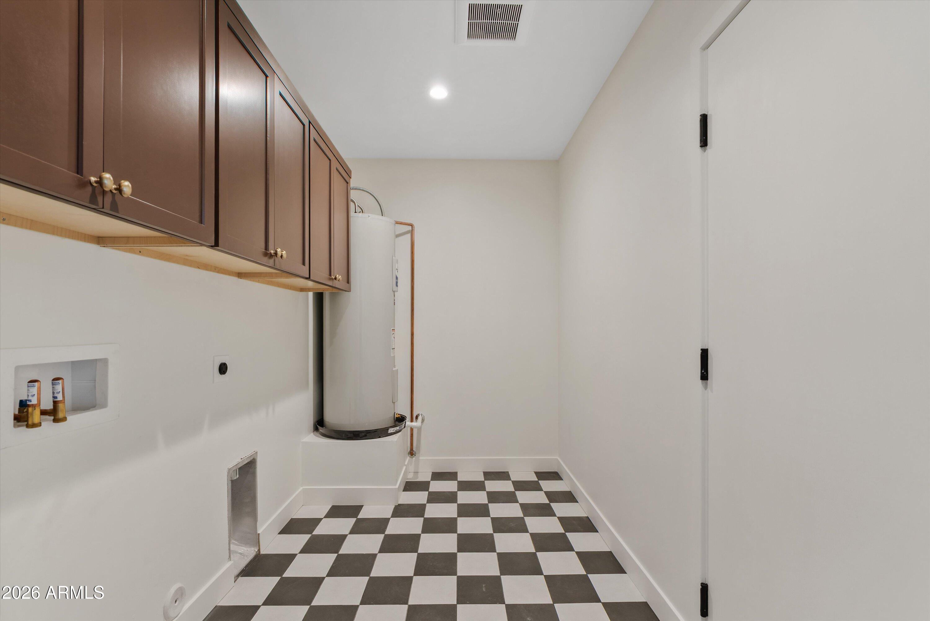 2941 East Cheery Lynn Road Phoenix, AZ 85016 - Photo 17 of 25 a bathroom with a glass door shower