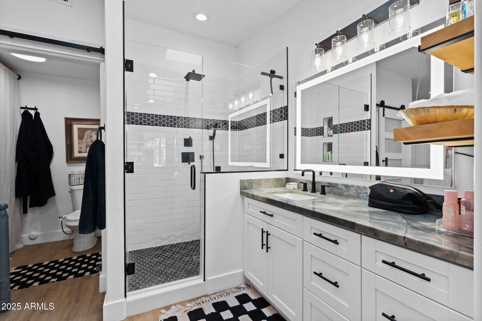 6835 East Peak View Road Scottsdale, AZ 85266 - Photo 101 of 107 a bathroom with a shower sink and mirror