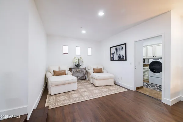 a view of parking garage with furniture