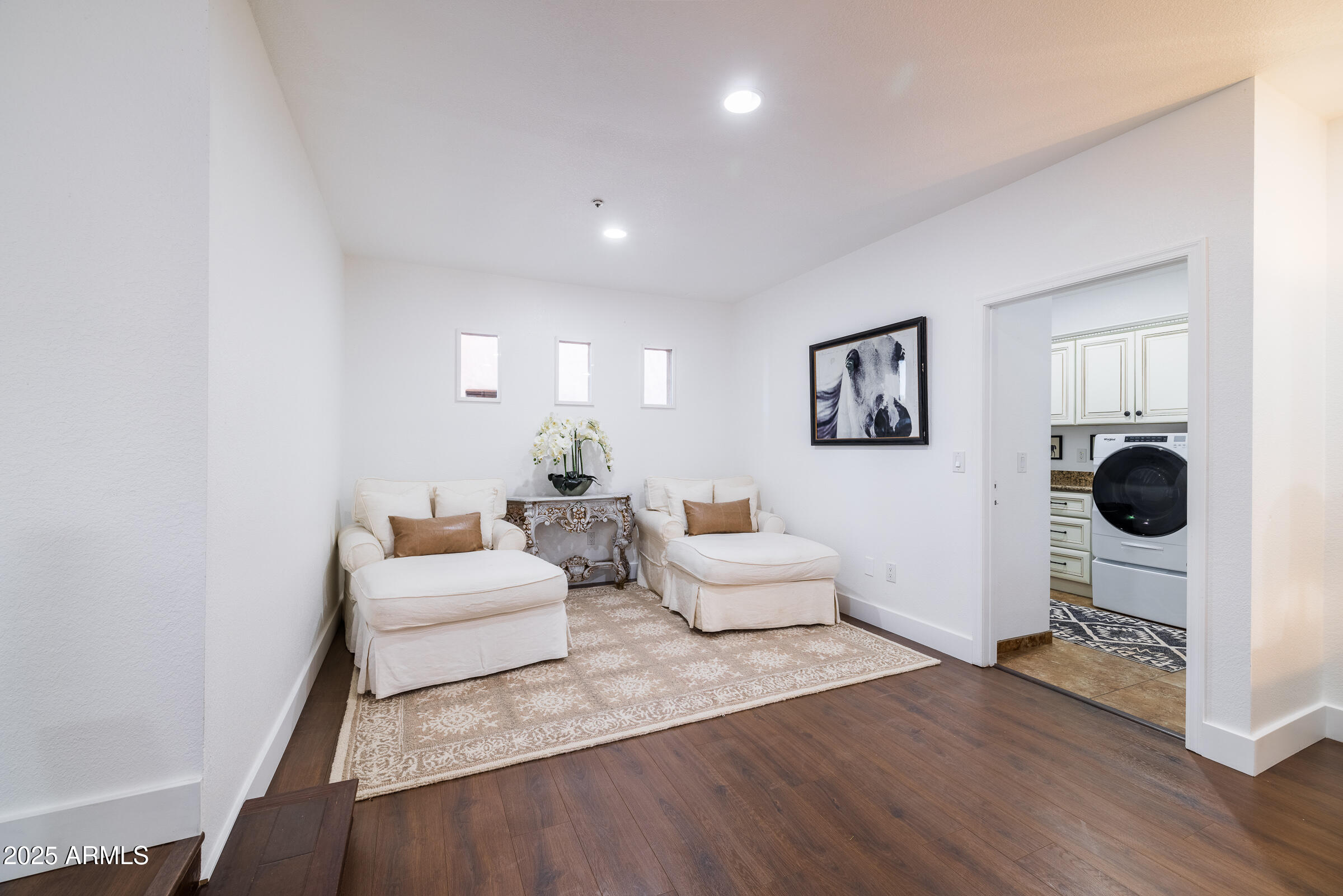 6835 East Peak View Road Scottsdale, AZ 85266 - Photo 17 of 107 a living room with furniture and a wooden floor