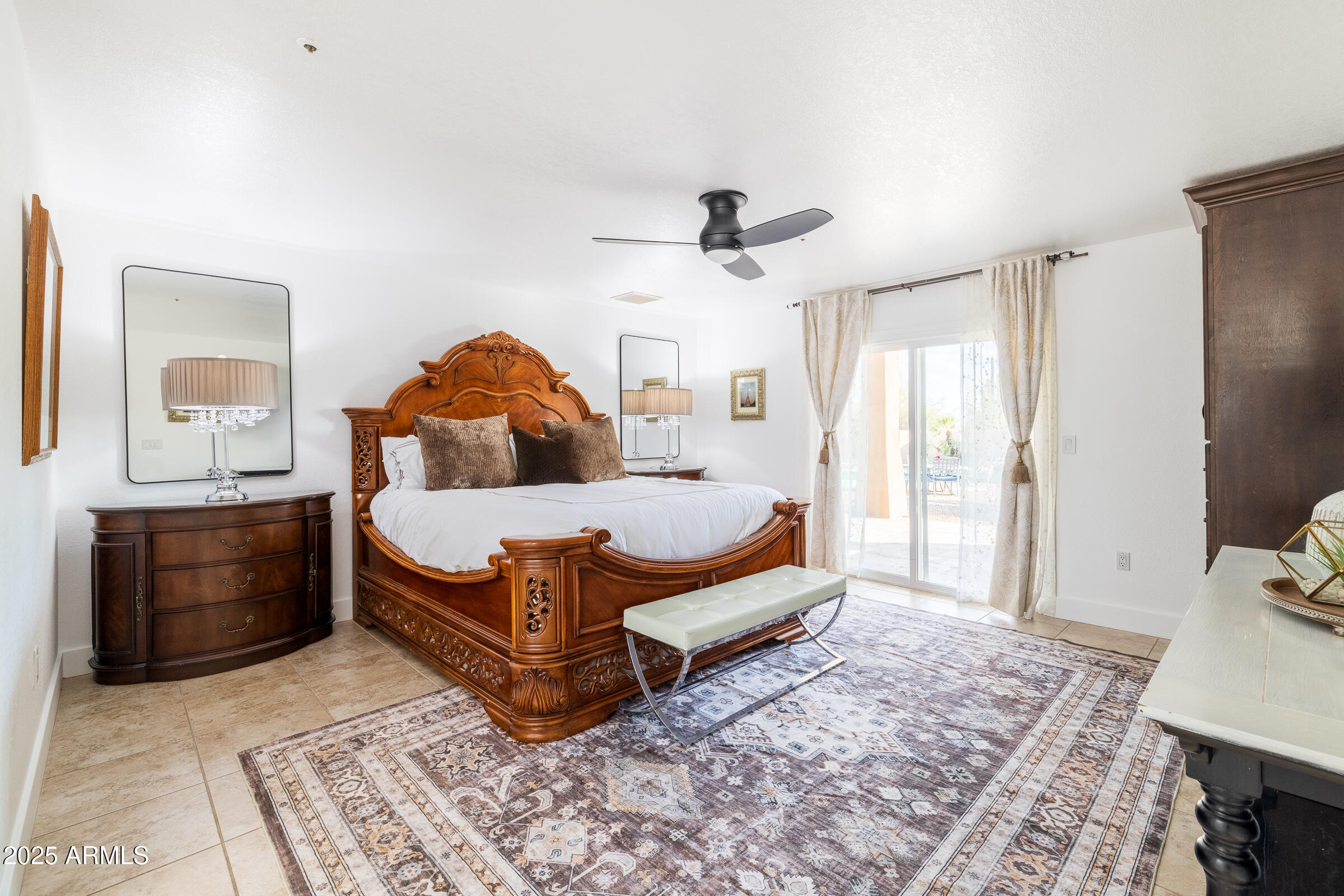 6835 East Peak View Road Scottsdale, AZ 85266 - Photo 18 of 107 a bedroom with a bed and window