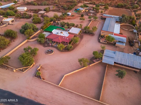 a kitchen with cabinets appliances and a sink