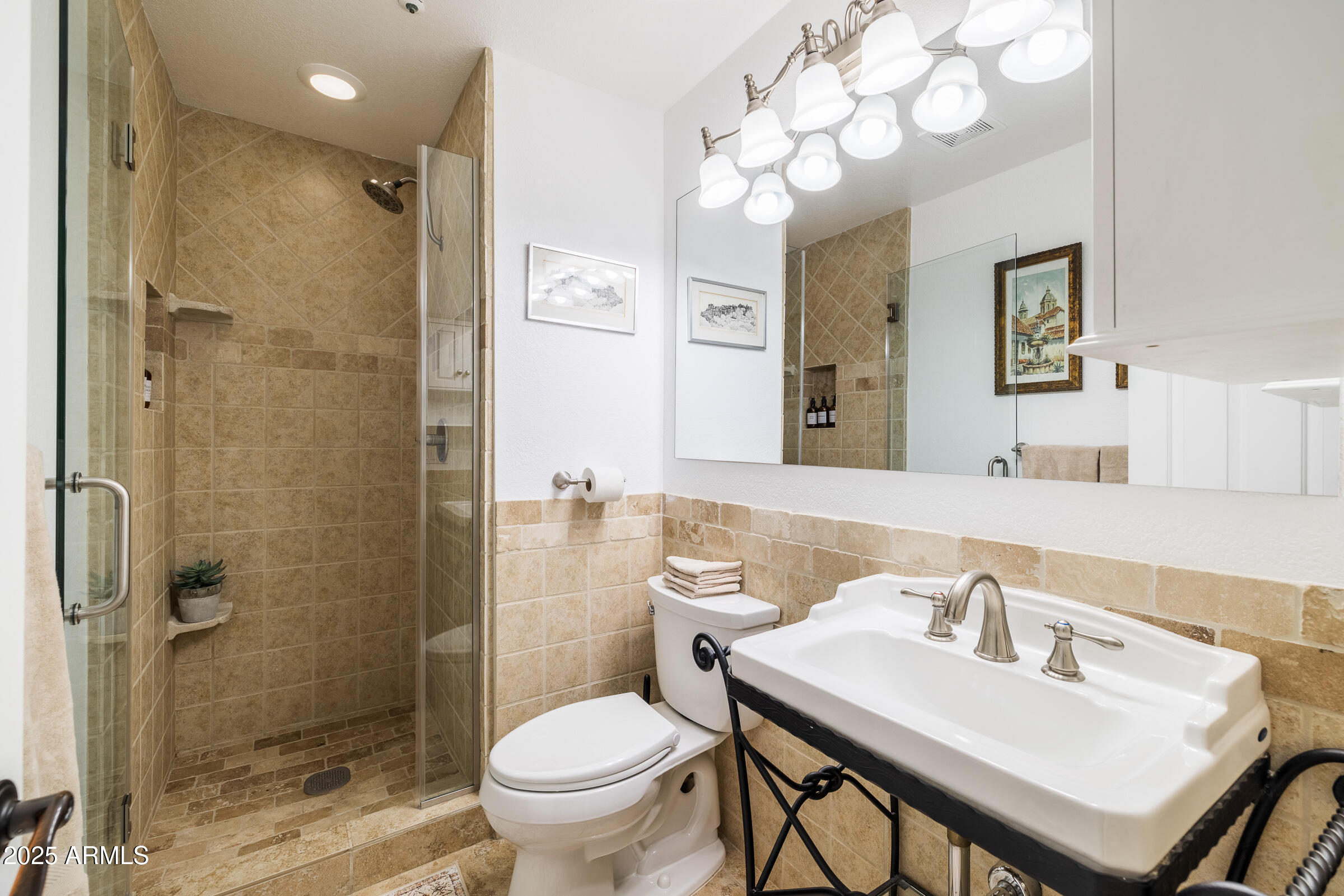 6835 East Peak View Road Scottsdale, AZ 85266 - Photo 55 of 107 a bathroom with a sink toilet and shower