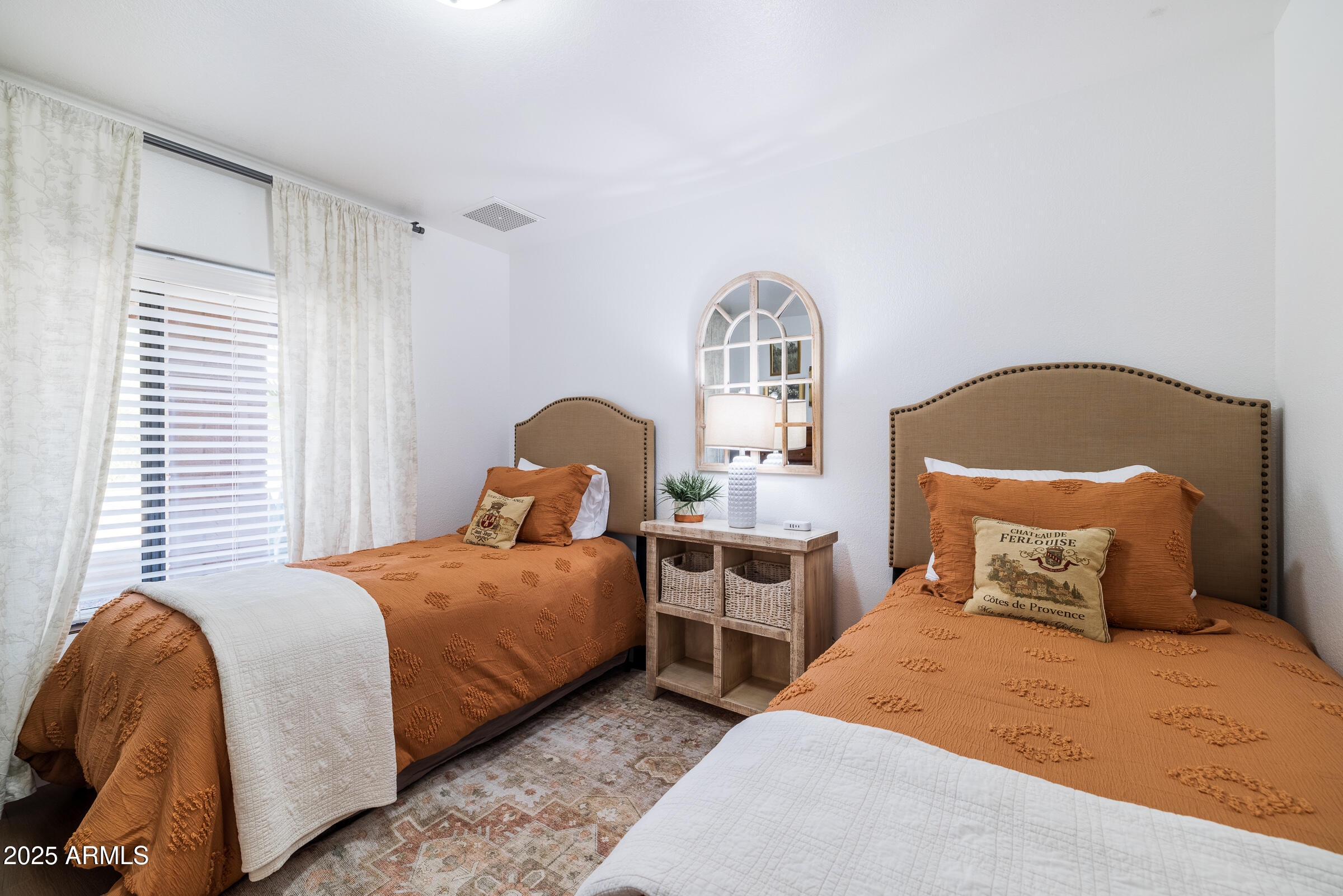 6835 East Peak View Road Scottsdale, AZ 85266 - Photo 57 of 107 a bedroom with bed and a window