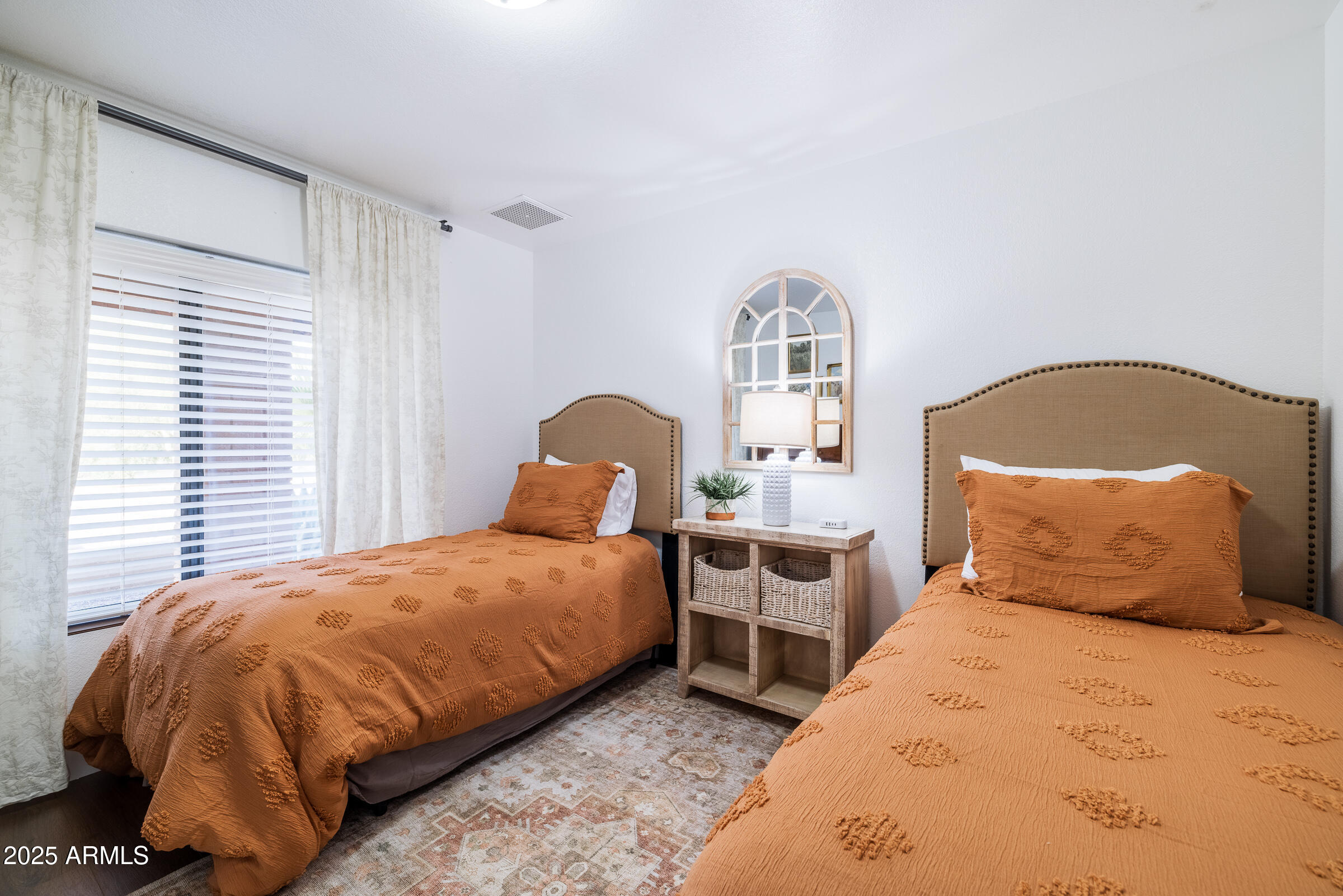 6835 East Peak View Road Scottsdale, AZ 85266 - Photo 58 of 107 a bedroom with a bed and a window