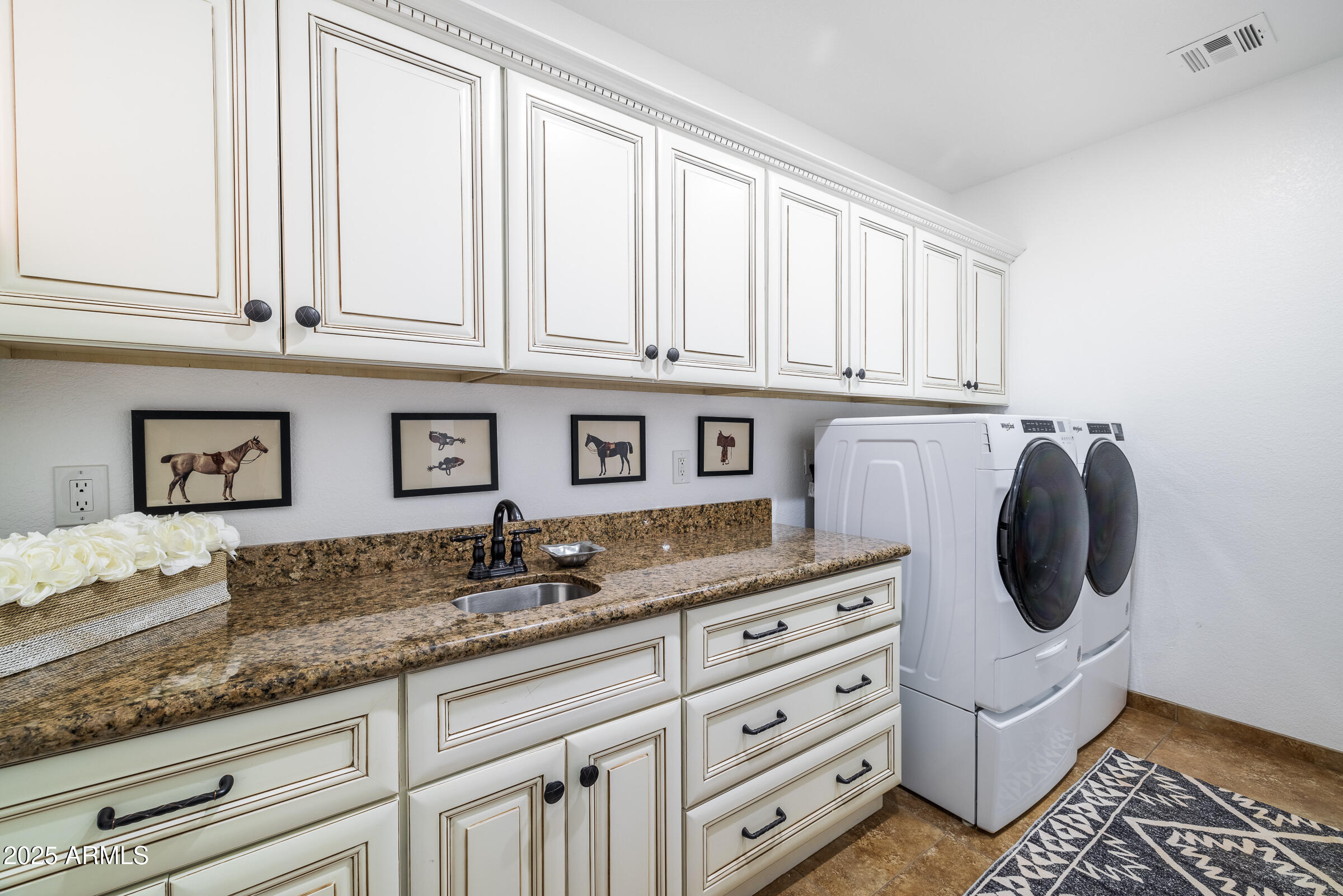 6835 East Peak View Road Scottsdale, AZ 85266 - Photo 59 of 107 a kitchen with cabinets appliances and a sink